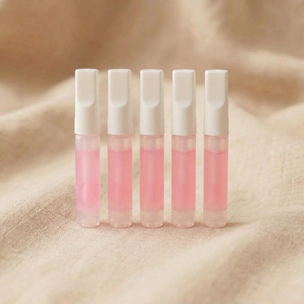 Glow Glue pack de 5 – cinq tubes de colle à ongles liquide rose sur lin beige