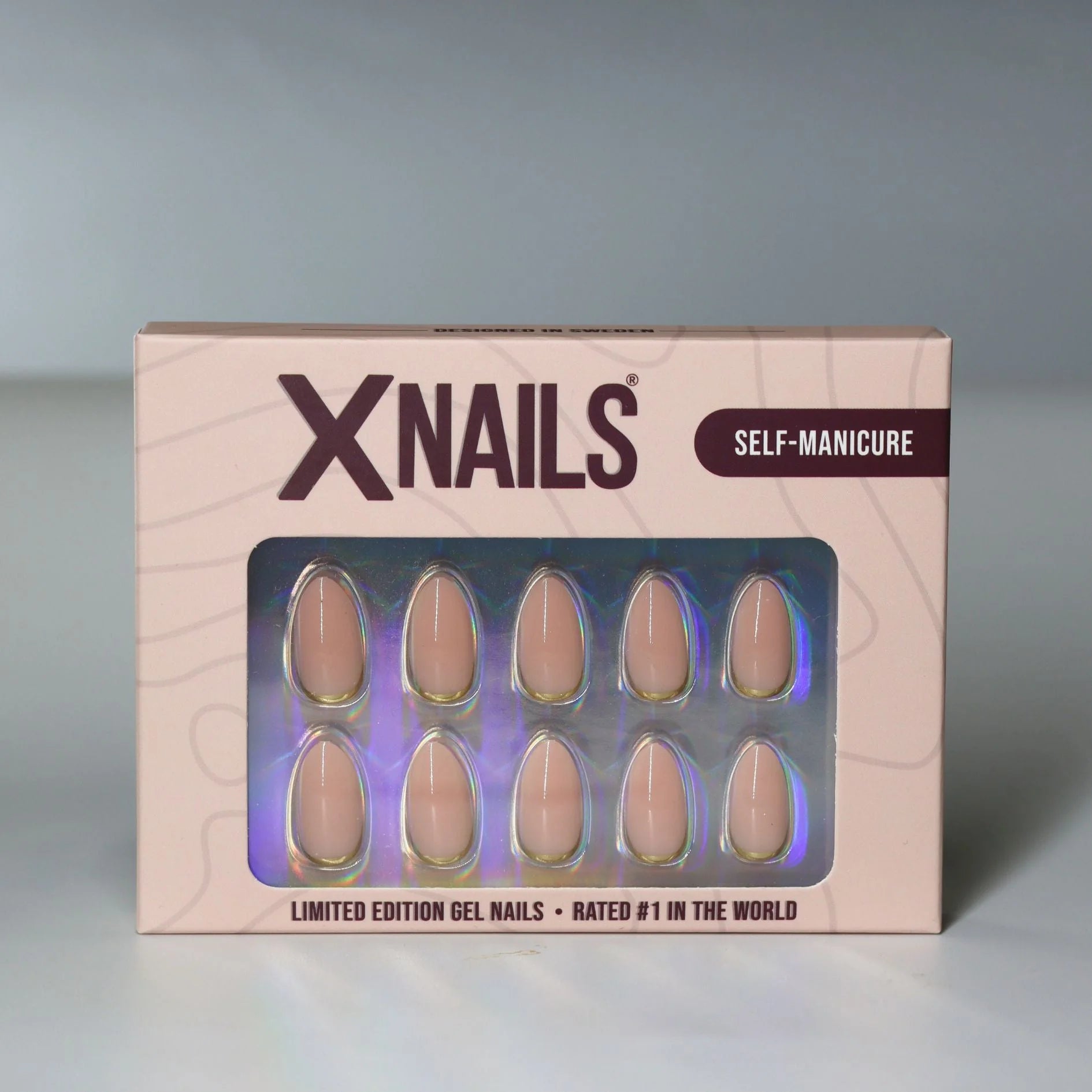 Golden Glimmer XNails förpackning – limited edition gelénaglar i nude mandel med guld