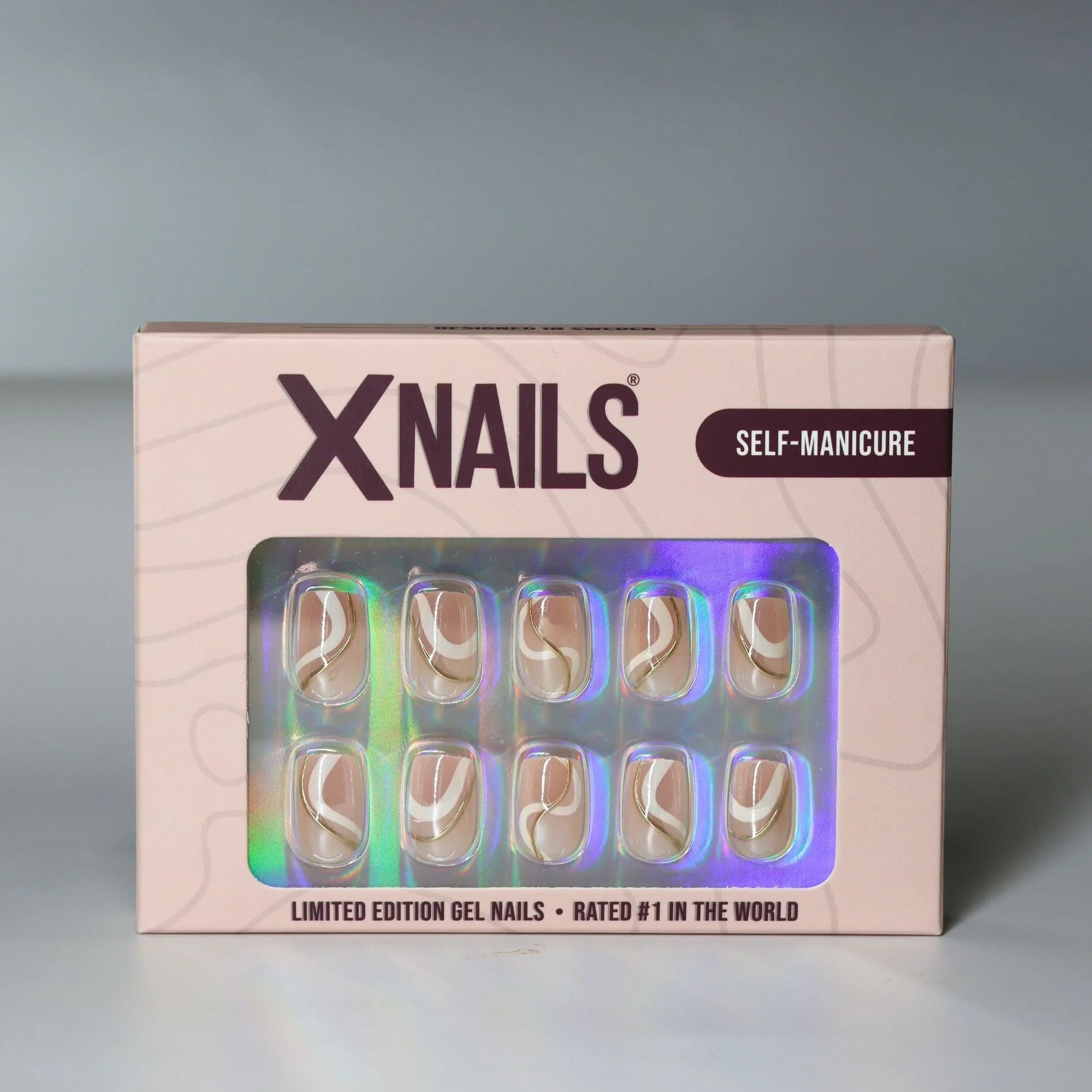 Summer Swirl XNails förpackning – limited edition gelénaglar med guld swirl design